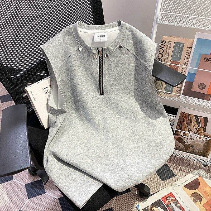 Black half-zip studded vest
