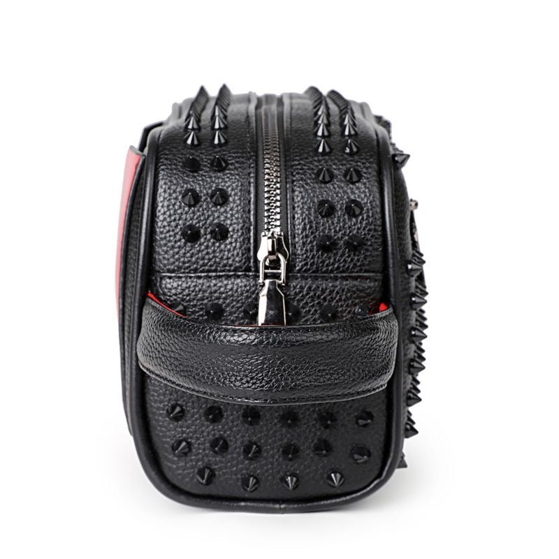 Christian-L style studded clutch bag