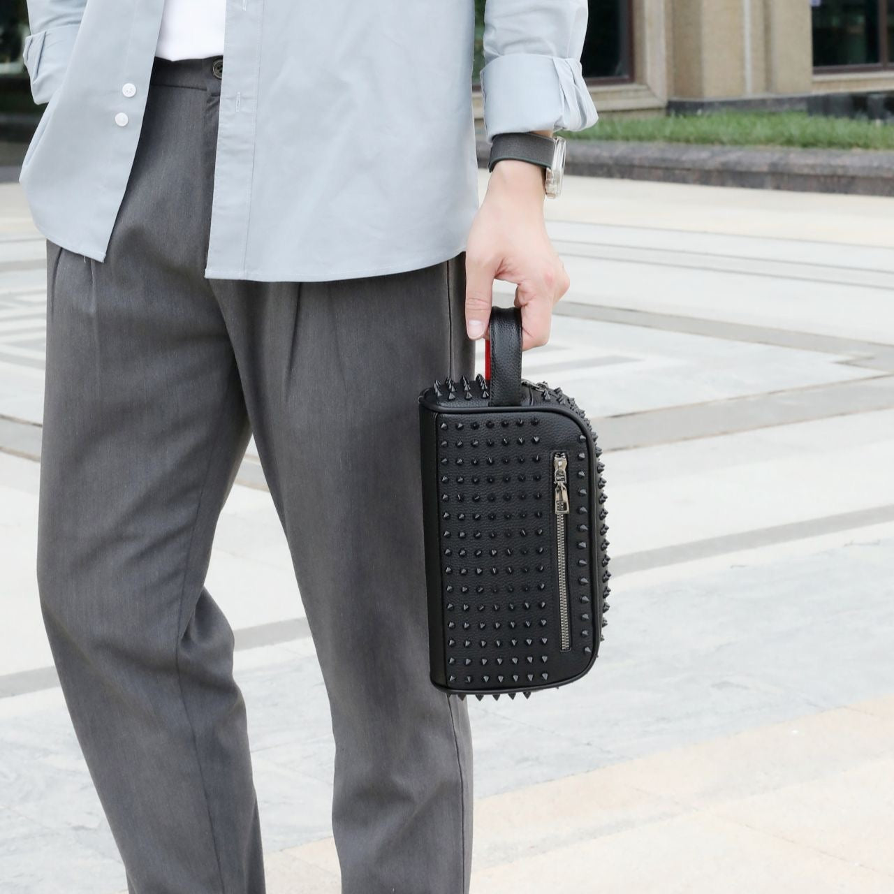 Christian-L style studded clutch bag