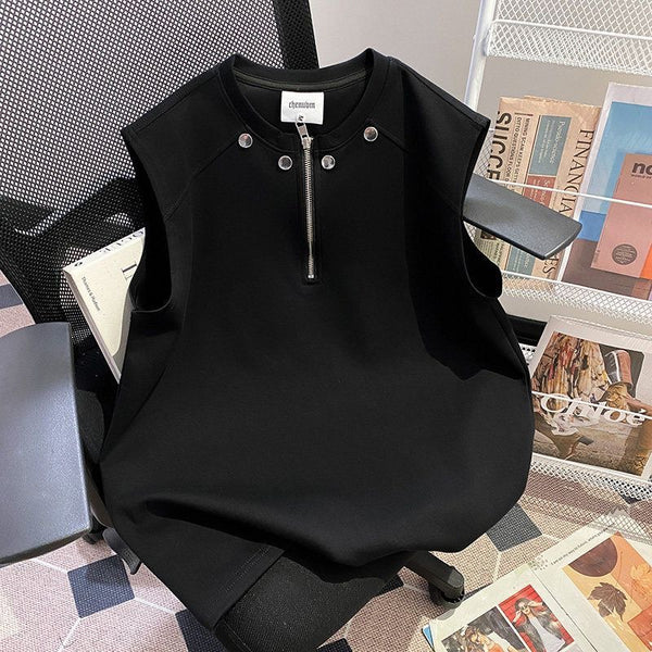 Black half-zip studded vest